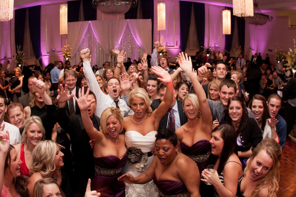 Bride-Bridesmaids-and-Wedding-Guests-Having-Fun-Together-in-Wedding-Party